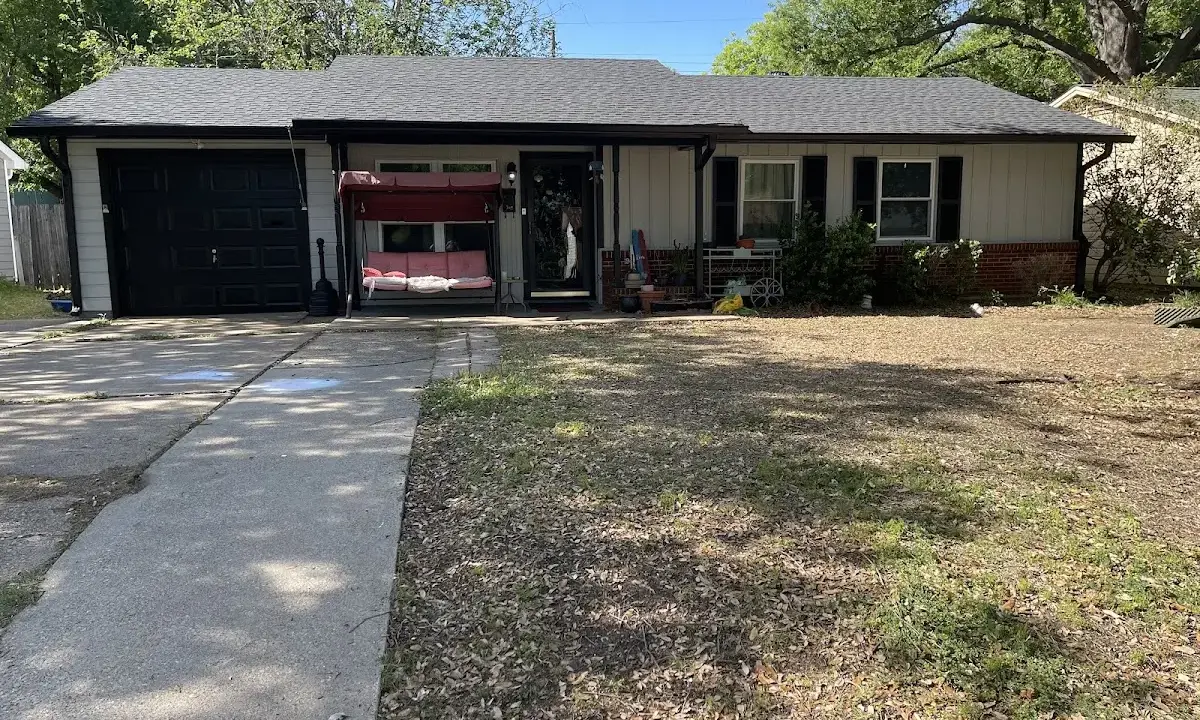 Asphalt Shingle Roof Repair crew at work on a residential roof in Kennedale
